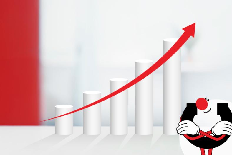 Manuhahmo poseeraa oikeassa alakulmassa tyytyväisen näköisenä kameralle taustanaan viiden alavasemmalta yläoikealle kohoavien pylväiden rivi, jonka yläpuolella etenee niiden mukaisesti diagonaalissa punainen nuoli.